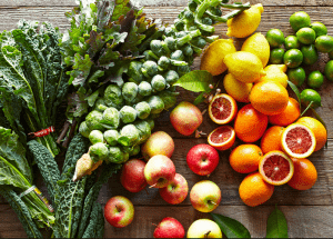 a group of fruits and vegetables on a wood surface Healthy Weight Loss Diets Tamworth